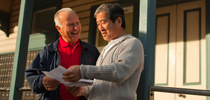 Member of the community reading a document