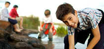 Kids playing on the creek