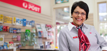 Australia Post employee in business hub