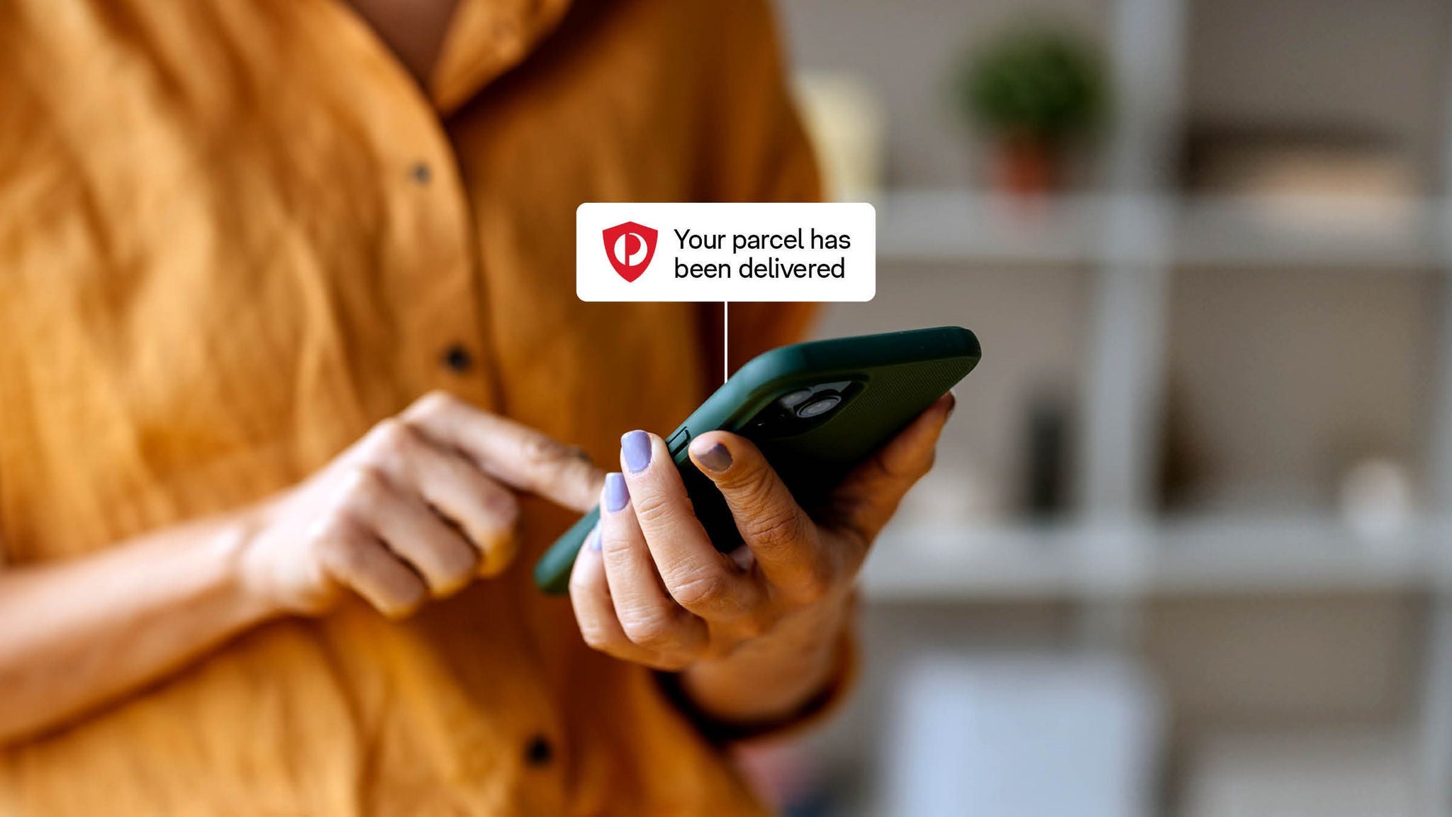 photo-woman-holding-phone-yellow-shirt-notification-bubble-your-parcel-has-been-delivered