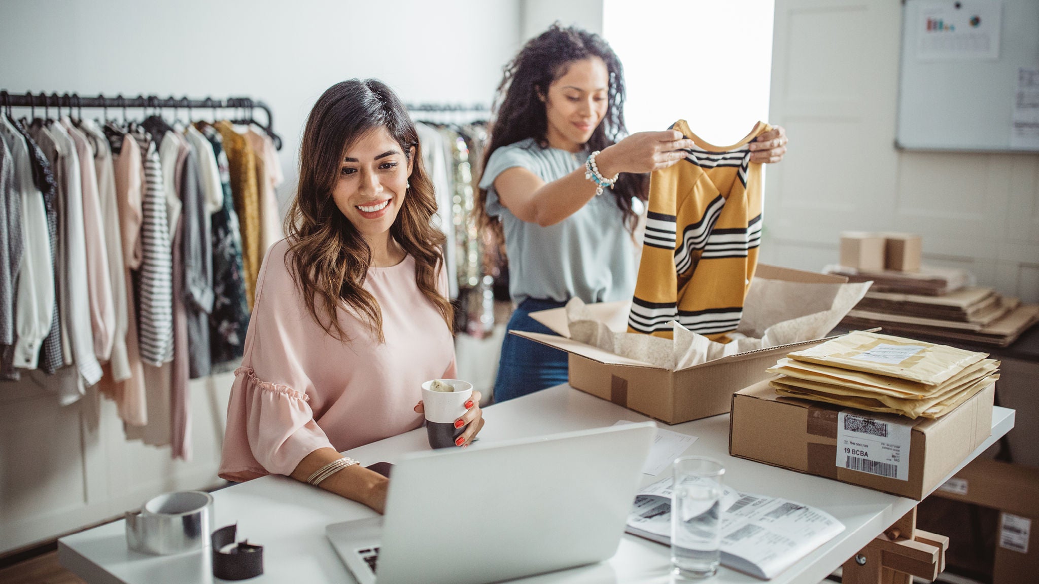 photo-two-women-selling-online-small-business-clothes