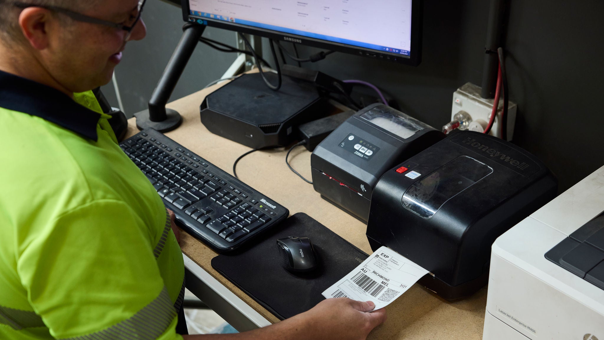 Employee printing a shipping label