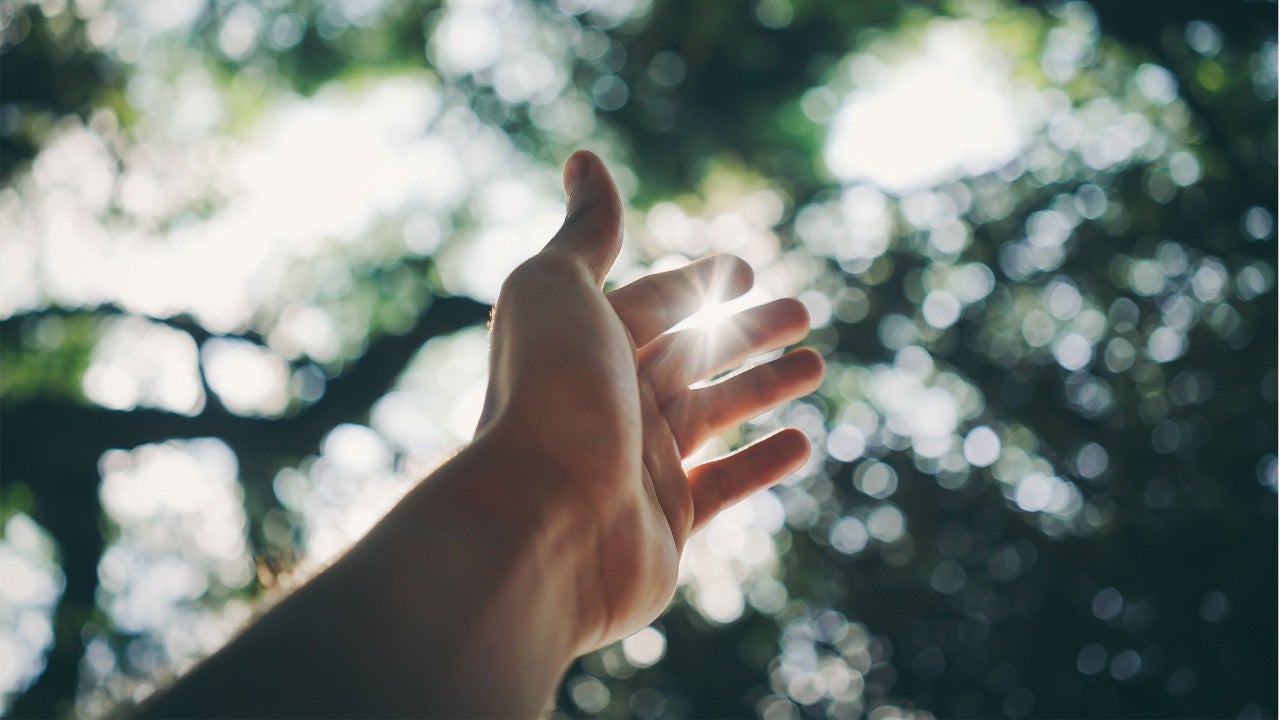 photo-hand-reaching-to-sky