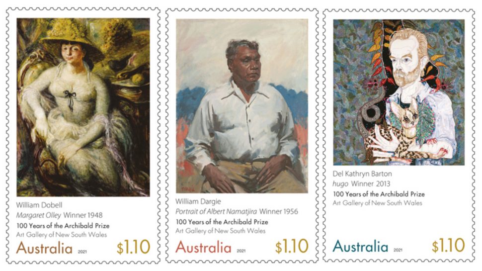 Three stamps. The first is a portrait of a woman in Victorian garments. The words ‘William Dobell, Margaret Olley Winner 1948, 100 Years of the Archibald Prize, Art Gallery of New South Wales’ run beneath it. The second stamp is a portrait of a man dressed in a white shirt and black pants. The words ‘William Dargie, Portrait of Albert Namatjira 1956, 100 Years of the Archibald Prize, Art Gallery of New South Wales’ run beneath it. The third is a portrait of Hugo Weaving. The words ‘Del Kathryn Barton, hugo 2013, 100 Years of the Archibald Prize, Art Gallery of New South Wales’ run beneath it.