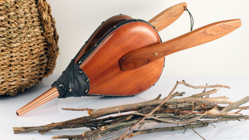 A pair of red cedar fire bellows