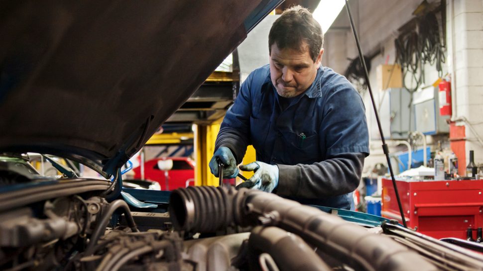 Mechanic working on a car