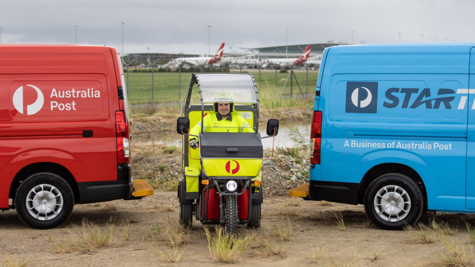 ILF member passing a parcel to an AP worked at the parcel hatch