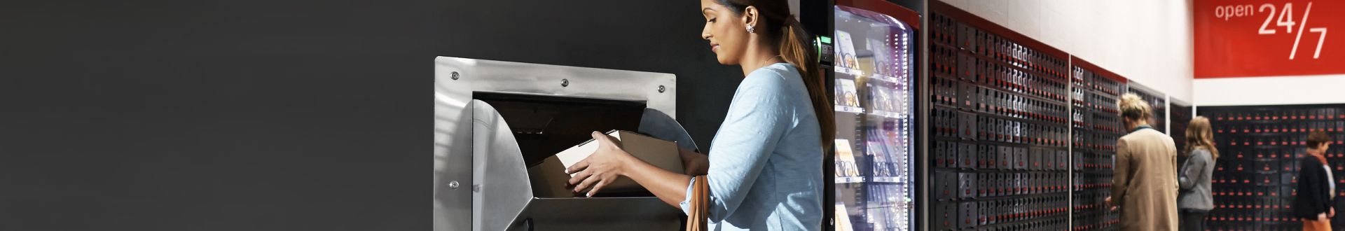 A person in an Australia Post office dropping off their large parcel to be sent